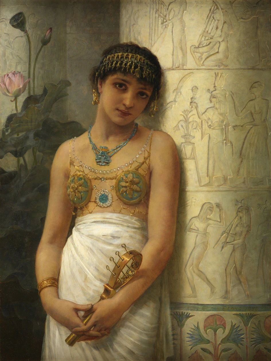 Una ragazza egiziana con un sistrum